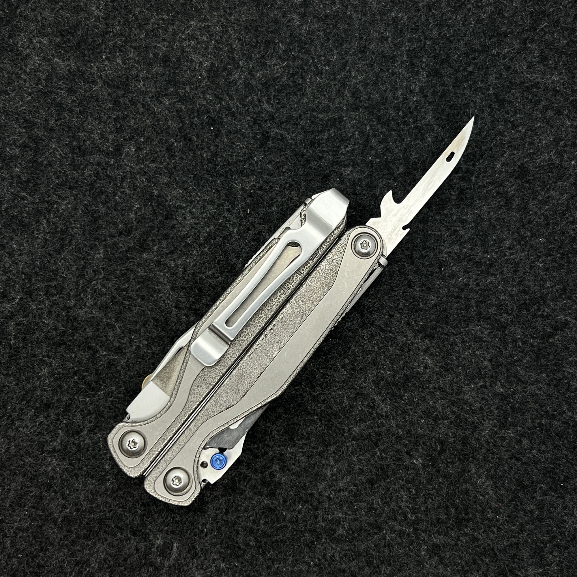 Home Improvement Stores - Bottle Opener with Awl Perforator and